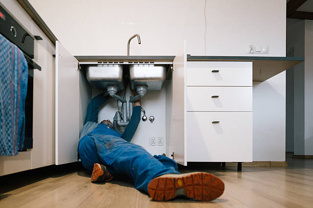 Professional Plumbing technician working in DeWitt, IA